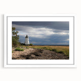 Abstract art print of Connecticut scenery in muted green and blue tones, framed with a white mat.