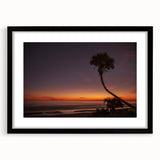 Abstract art print featuring vibrant, colorful textures on a large canvas, framed in black, suitable for living room decor.