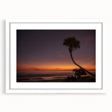 Abstract art print of Daytona scenery in muted blue and green tones on a framed white mat.