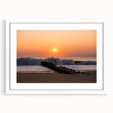 Abstract art print of Delaware scenery in muted earth tones on a framed white mat, suitable for dining room decor.