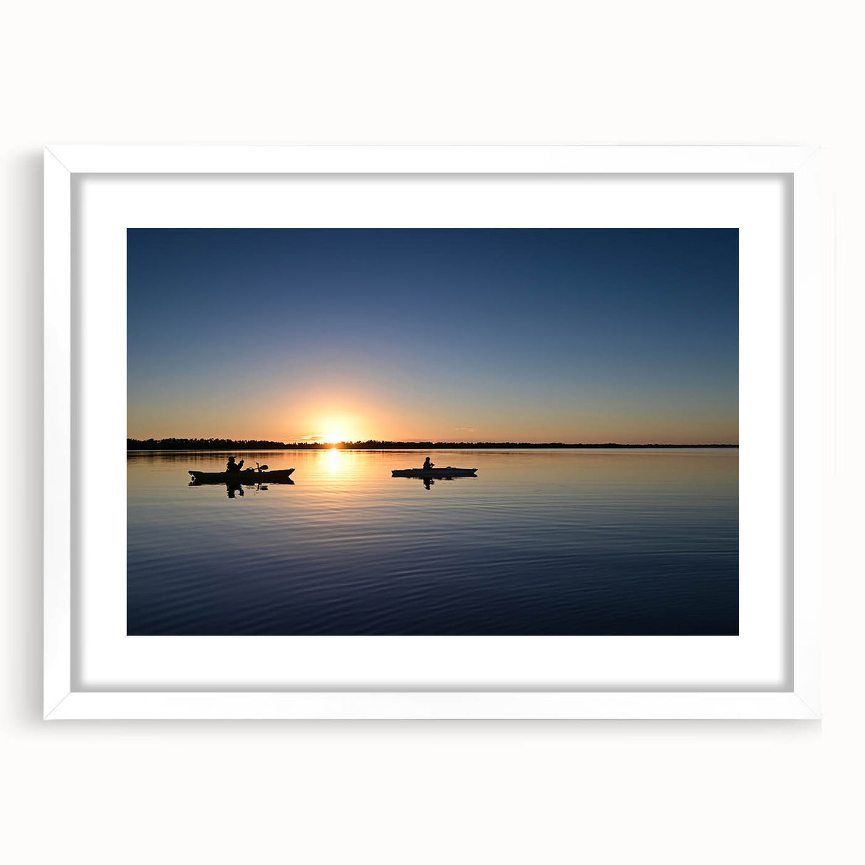 Abstract art print of Everglades scenery in muted green and blue tones, framed with a white mat.