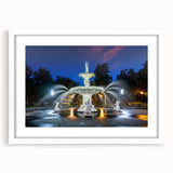 Abstract art print of Savannah landscape in muted green and blue tones on a framed white mat, suitable for dining room decor.