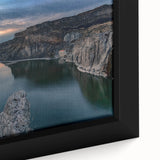 Close-up of textured black wall art depicting Idaho scenery in vibrant colors on a framed canvas.