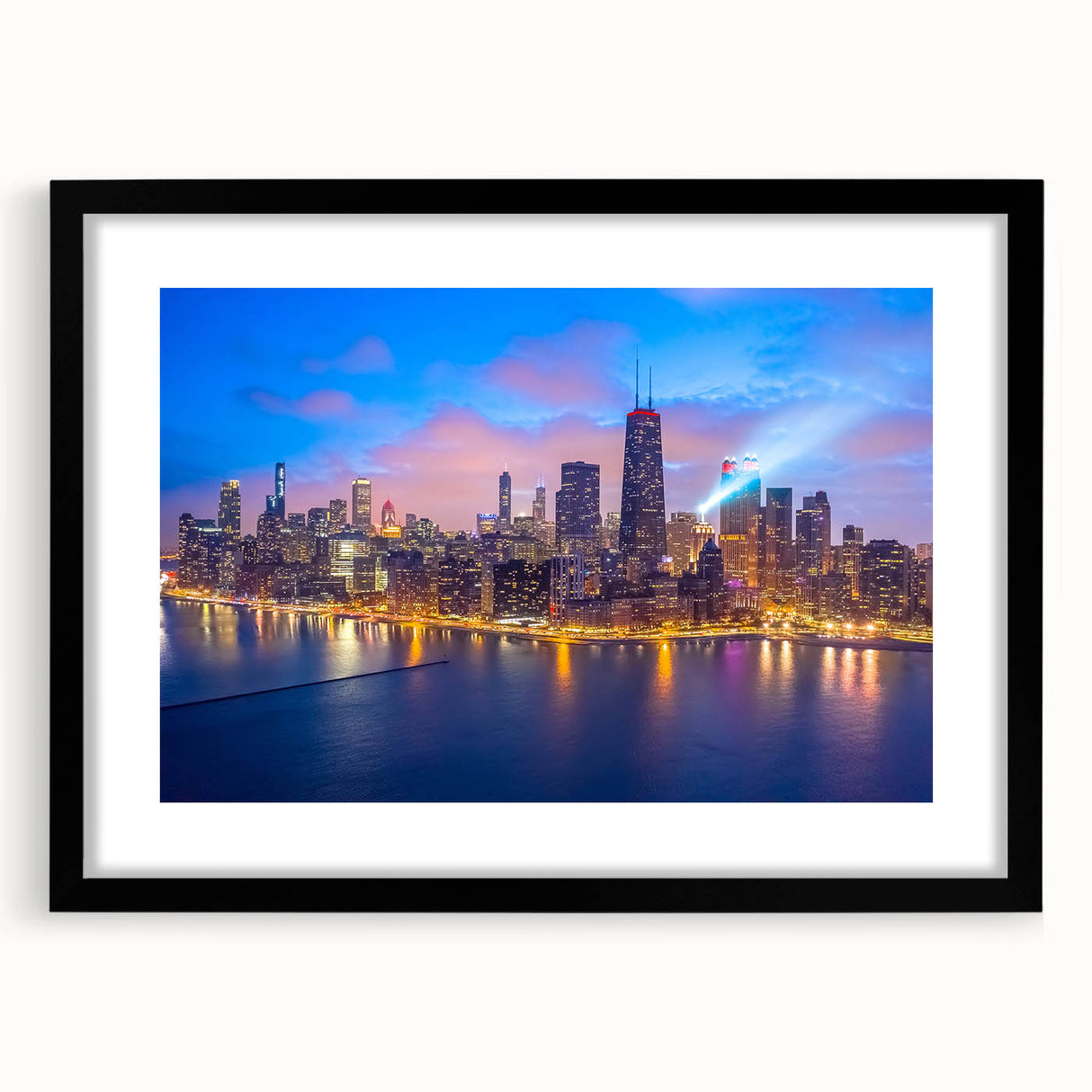 Abstract art print of Chicago skyline in colorful, textured hues on a large black-framed canvas, ideal for living room decor.