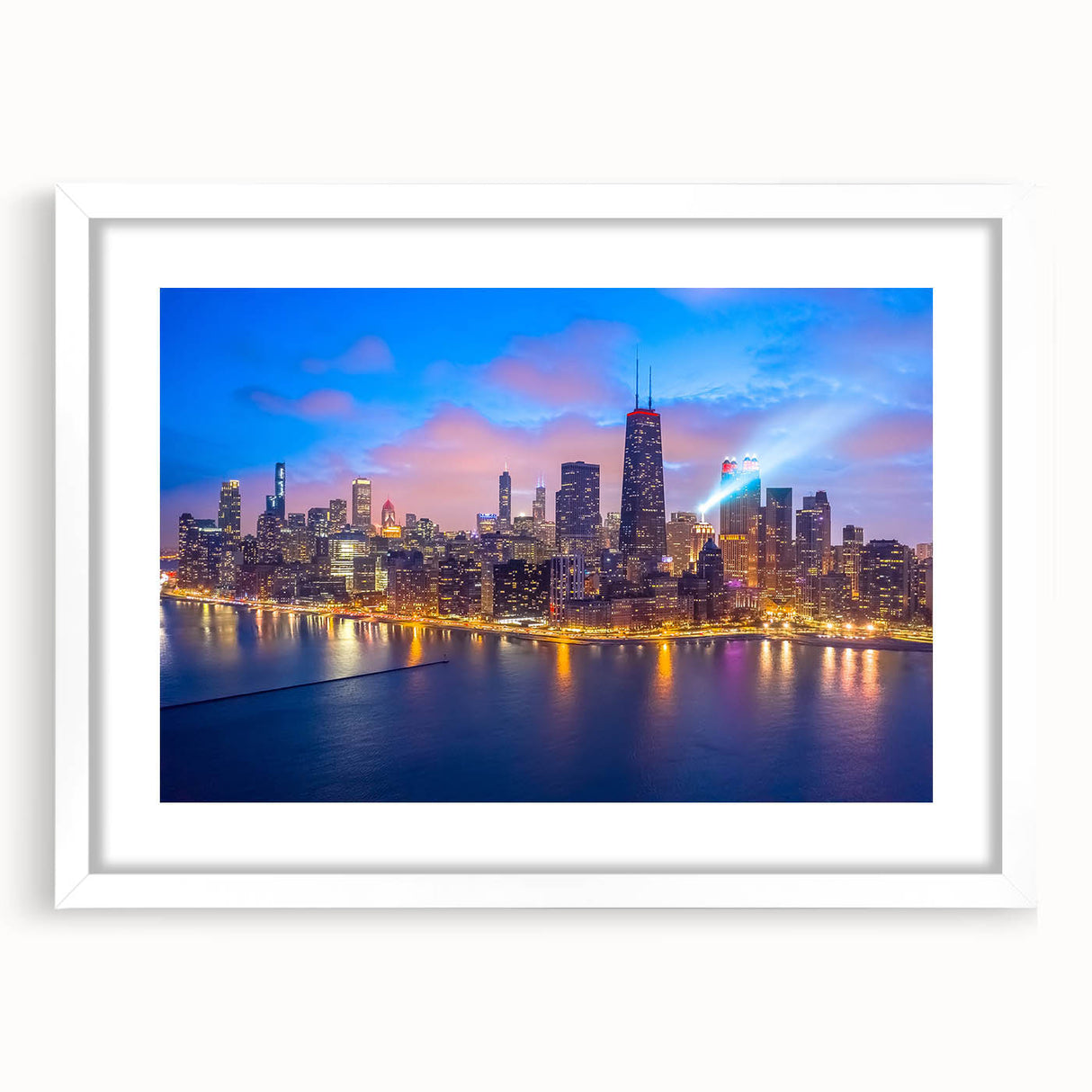 Abstract art print of Chicago skyline in muted gray and blue tones on a framed white mat, suitable for dining room decor.