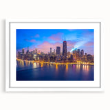 Abstract art print of Chicago skyline in muted gray and blue tones on a framed white mat, suitable for dining room decor.