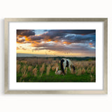 Abstract textured art print of Kentucky scenery in muted earth tones, framed in silver, ideal for bedroom decor.
