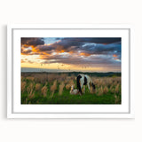 Abstract art print of Kentucky scenery in muted earth tones on a white matted frame.