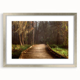 Textured abstract art print depicting a serene Louisiana landscape in muted earth tones, framed in silver.