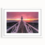 Abstract art print of a Maine coastal scene in muted blue and gray tones, framed with a white mat.