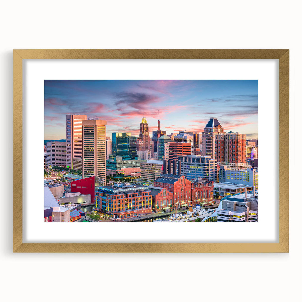 Extra large abstract art print of Baltimore skyline in muted gray and gold, framed with a golden mat.