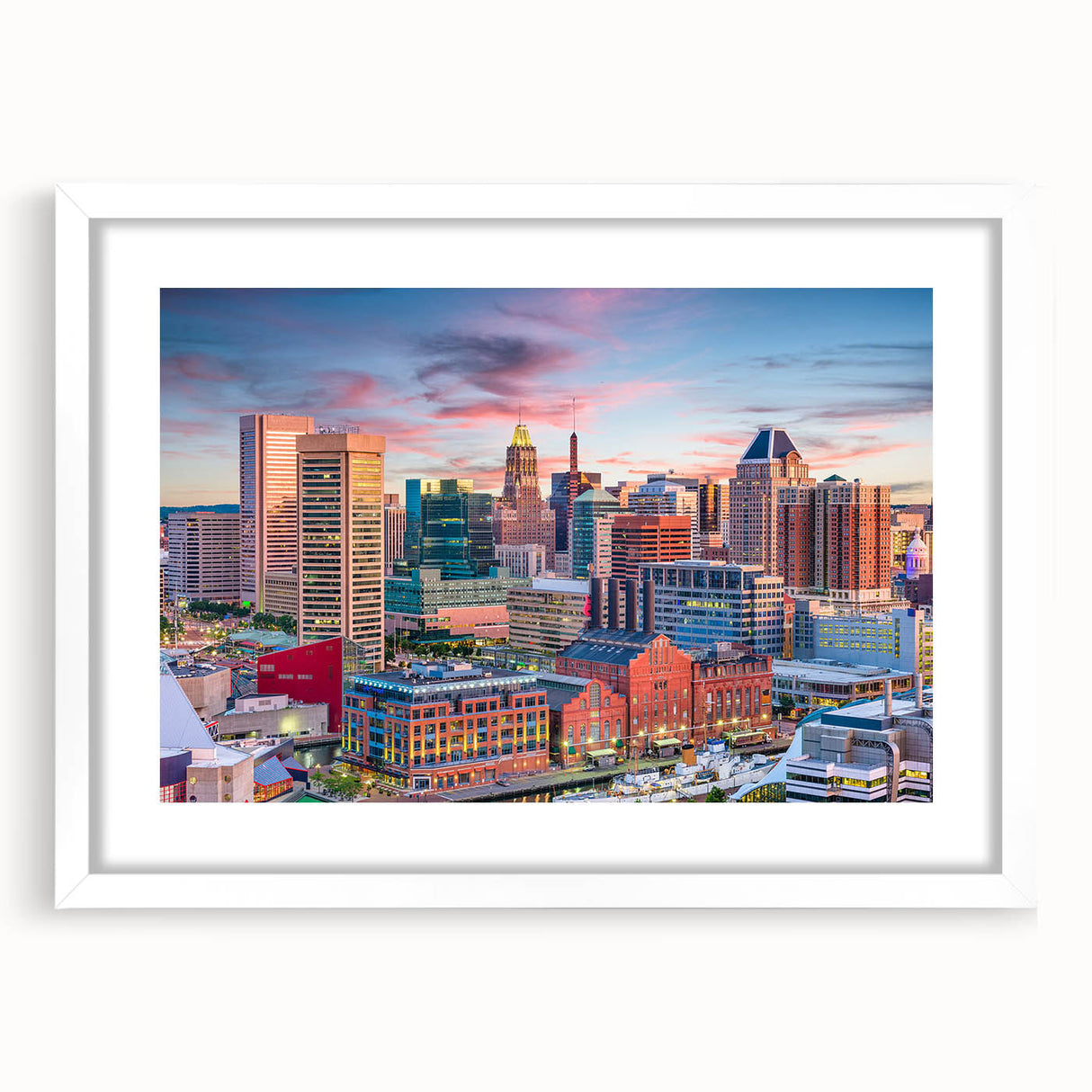 Abstract art print of Baltimore skyline in muted gray and blue tones on a white framed canvas.