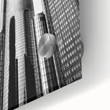 Large abstract depiction of Detroit skyline in muted blues and grays on acrylic glass, ideal for dining room art.