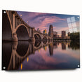 Acrylic print of a large abstract depiction of Minneapolis skyline in muted blue and gray tones.