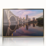 Acrylic print of Minneapolis skyline in muted gold and blue tones, framed, ideal for modern art wall decor.