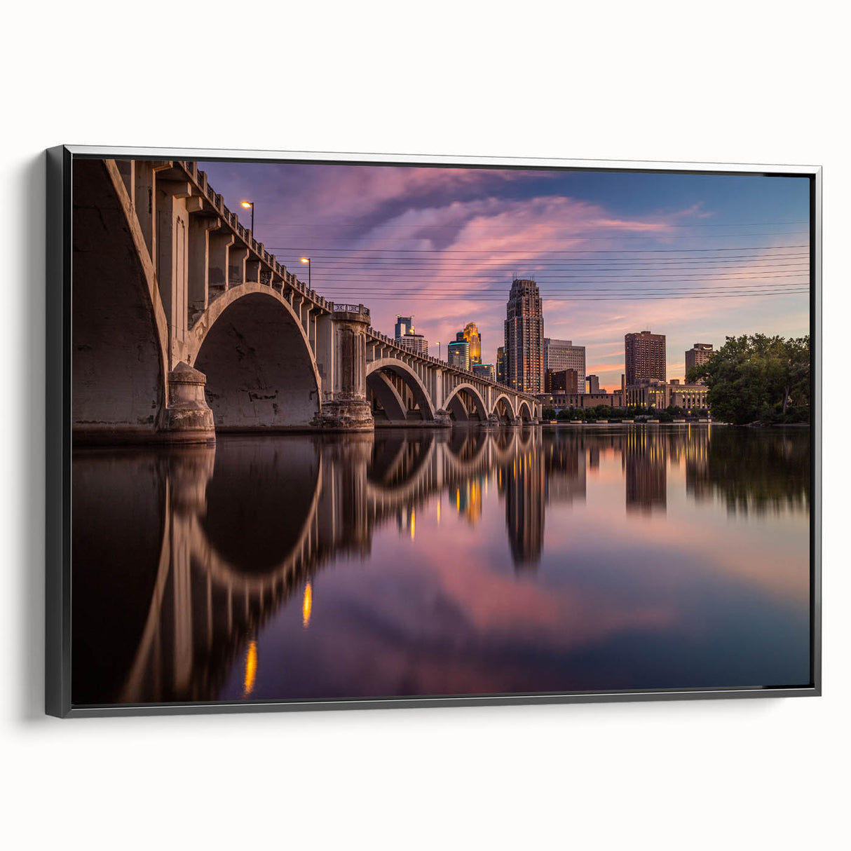 Black and white wall art of the Minneapolis skyline on a framed canvas, ideal for bedroom decor.