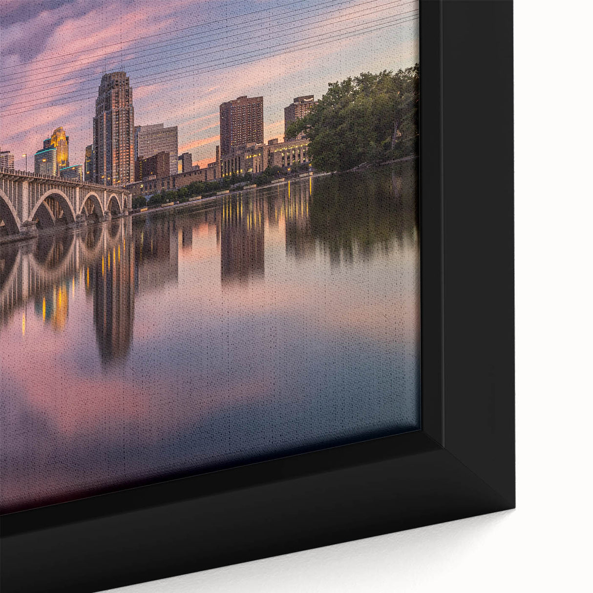 Extra large framed canvas of Minneapolis skyline in black with colorful, textured highlights, ideal for living room decor.
