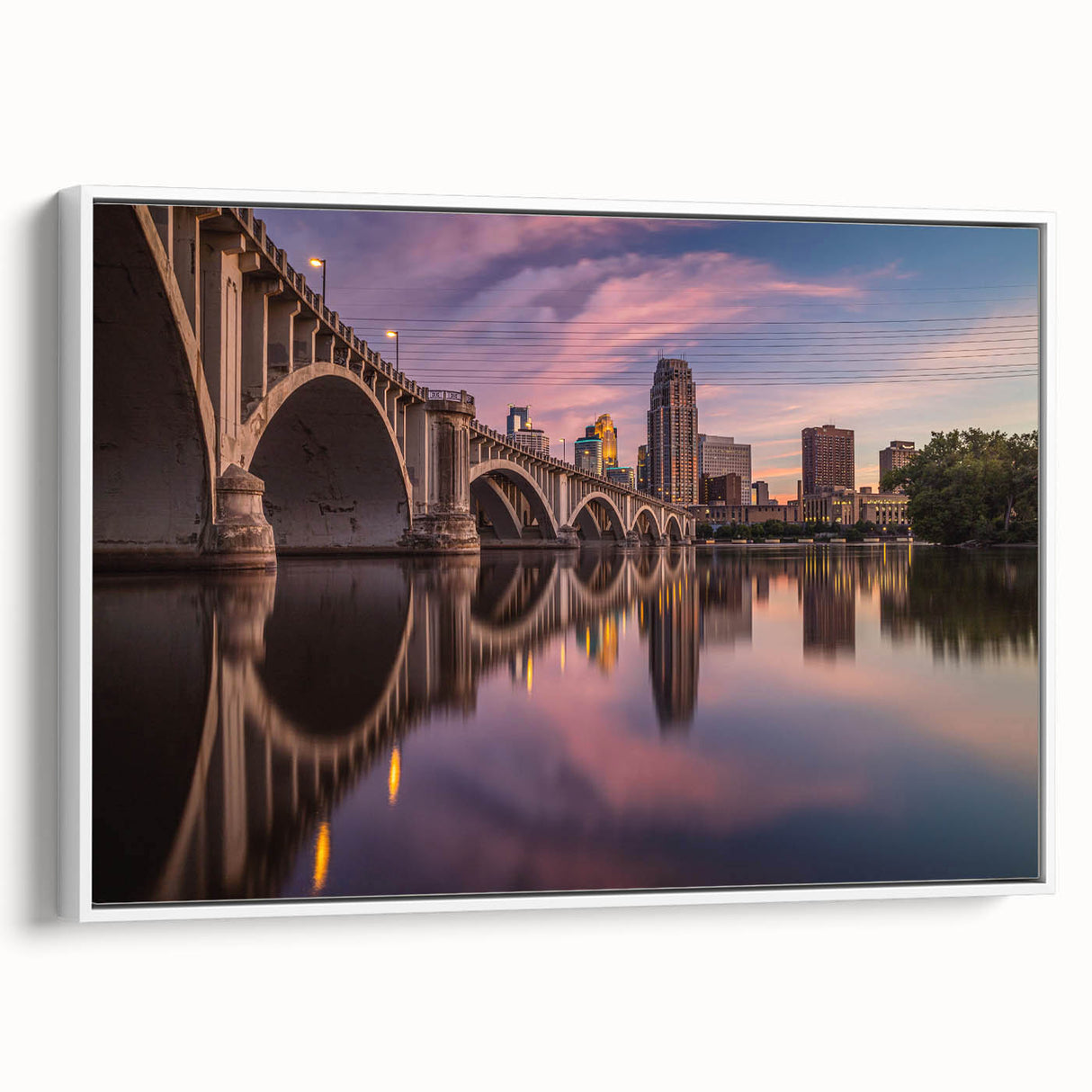 Vintage poster art of Minneapolis skyline in colorful art palette on extra large framed canvas, ideal for living room decor.