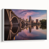 Vintage poster art of Minneapolis skyline in colorful art palette on extra large framed canvas, ideal for living room decor.