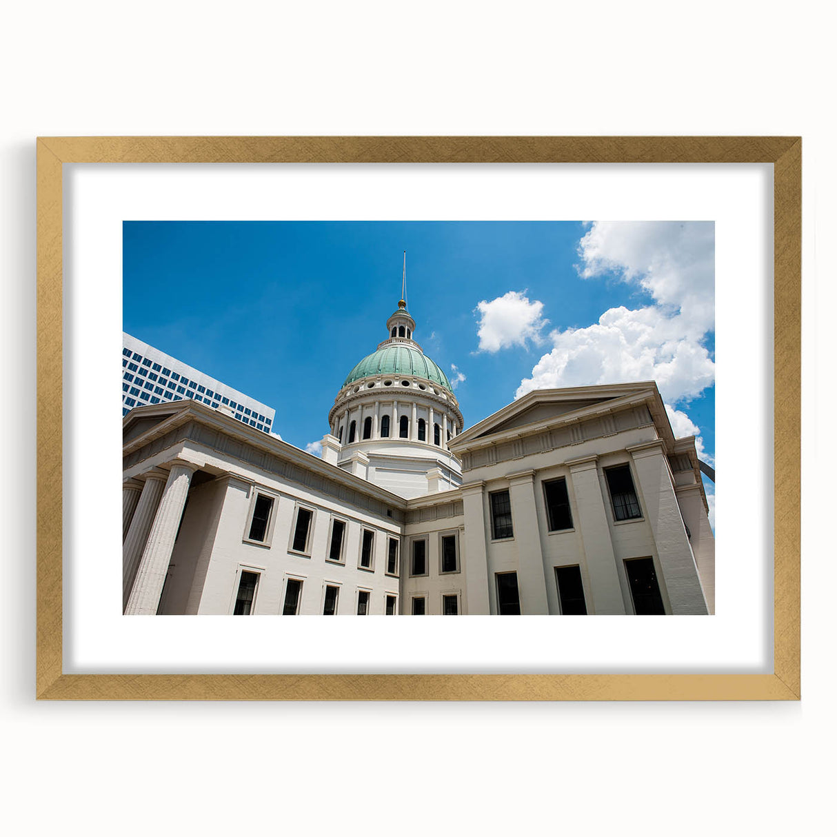Extra large abstract art print of St. Louis skyline with textured design in gold frame, ideal for living room decor.