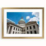 Extra large abstract art print of St. Louis skyline with textured design in gold frame, ideal for living room decor.