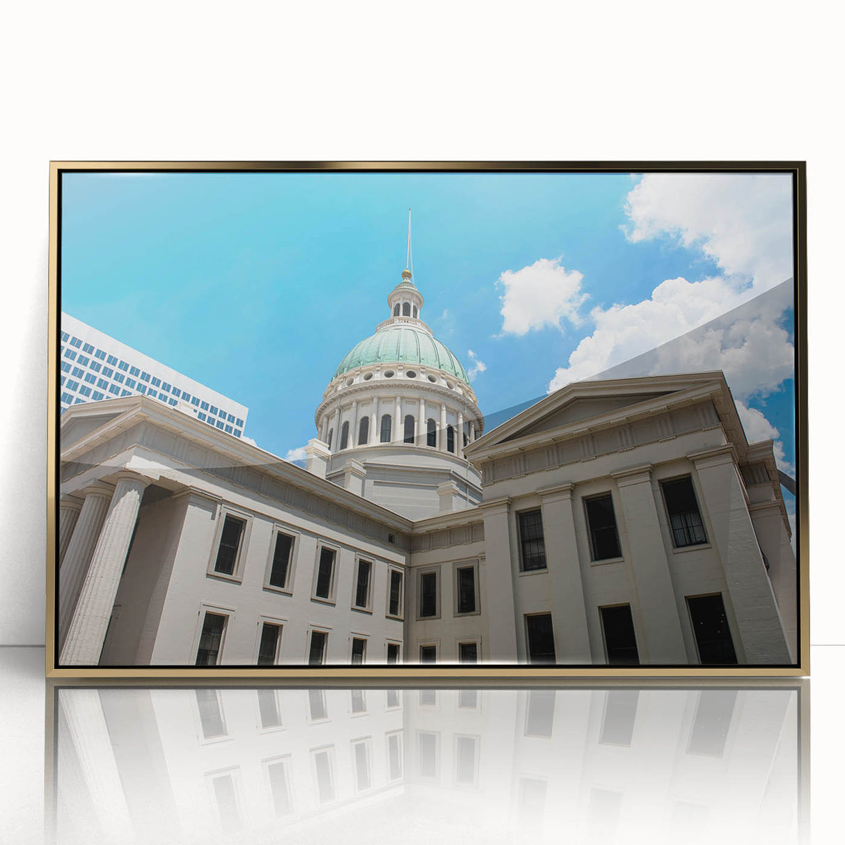 Framed acrylic print of St. Louis skyline in gold and blue tones, suitable for modern art wall decor.