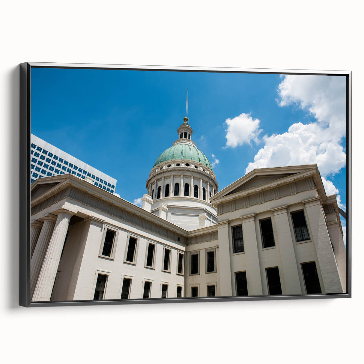 Black and white framed canvas of St. Louis skyline, ideal for bedroom wall decor.