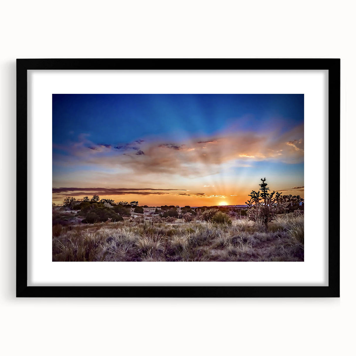 Abstract art print depicting a vibrant, textured New Mexico scenery in a large, black-framed mat.