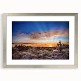 Textured art depicting abstract New Mexico scenery in muted earth tones on a framed silver mat, suitable for bedroom decor.