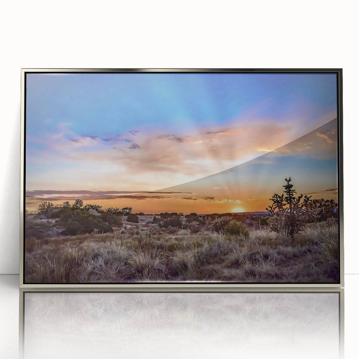 Mid-century modernist art depicting New Mexico scenery in muted earth tones on a silver-framed acrylic print.