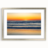 Textured abstract art print depicting the Outer Banks with muted blue and gray tones on a framed silver mat.