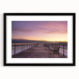 Abstract art print of colorful, textured scenery in an extra large black frame, ideal for living room decor.