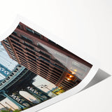 Extra large wall art featuring a line art design of flowers over a view of the Brooklyn Bridge, printed on rolled canvas.