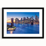 Abstract art print of Manhattan skyline in colorful, textured style on a large black-framed canvas.