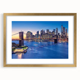 Extra large abstract art print of Manhattan skyline in textured gold frame, suited for living room decor.