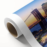 Art deco poster of Manhattan skyline in muted gray and blue tones, rolled canvas ideal for nursery wall art.