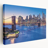 Panoramic view of Manhattan skyline in muted gray and blue tones on large stretched canvas, ideal for kitchen wall art.