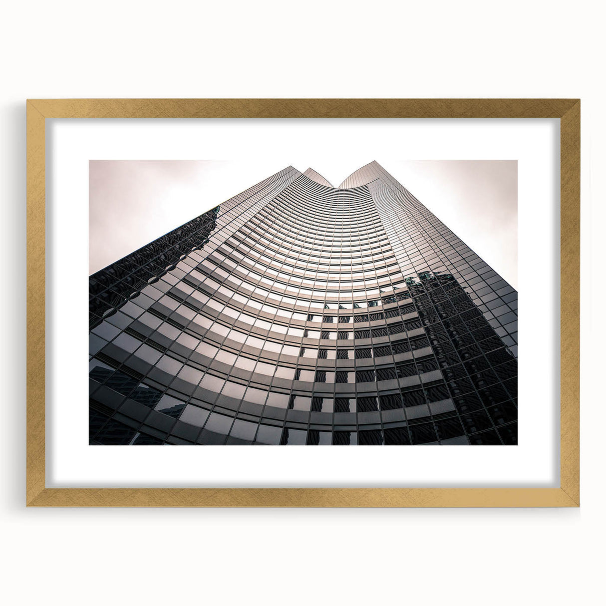 Extra large abstract art print of Seattle skyline in textured hues of blue and gray on a framed canvas.