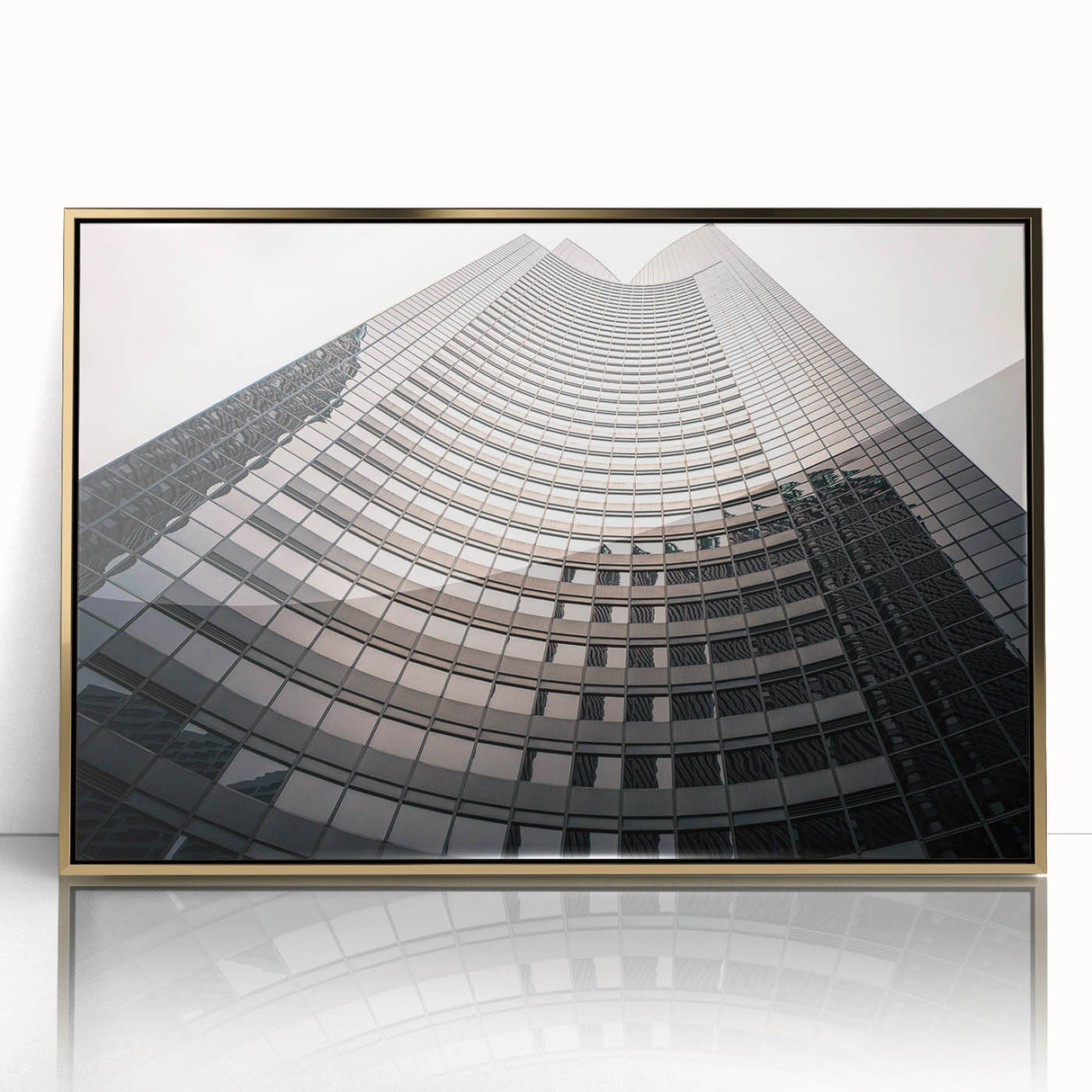 Acrylic print of Seattle skyline in muted gold and blue tones, framed, ideal for modern art wall decor.
