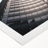 Art deco poster of Seattle skyline in muted blue and gray tones on rolled canvas, suitable for dining room wall art.