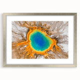 Extra large abstract art print of Yellowstone scenery in textured style, framed in silver, ideal for living room decor.