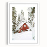 Abstract art print depicting a winter scene in muted blue and white tones on a framed canvas.
