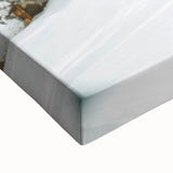 Large art featuring a black and white winter landscape painting on stretched canvas, ideal for bedroom wall decor.