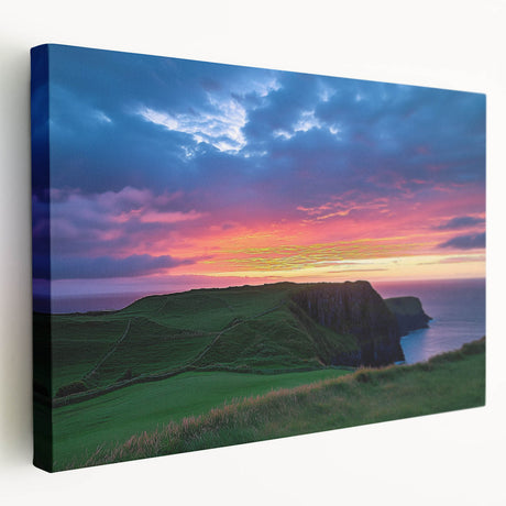 Stretched canvas artwork depicting a stunning landscape of rugged cliffs and vibrant sky, showcasing rich colors and dynamic textures, ideal for home decor.