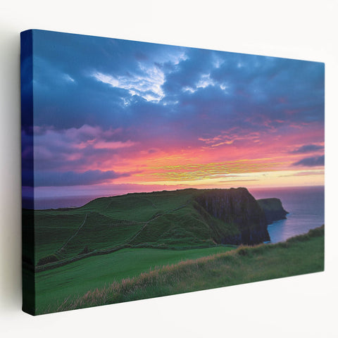 Stretched canvas artwork depicting a stunning landscape of rugged cliffs and vibrant sky, showcasing rich colors and dynamic textures, ideal for home decor.