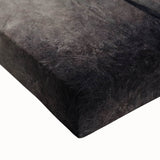 Close-up of vibrant abstract floral wall art on stretched canvas, showcasing intricate designs in shades of pink, green, and blue, perfect for modern decor.