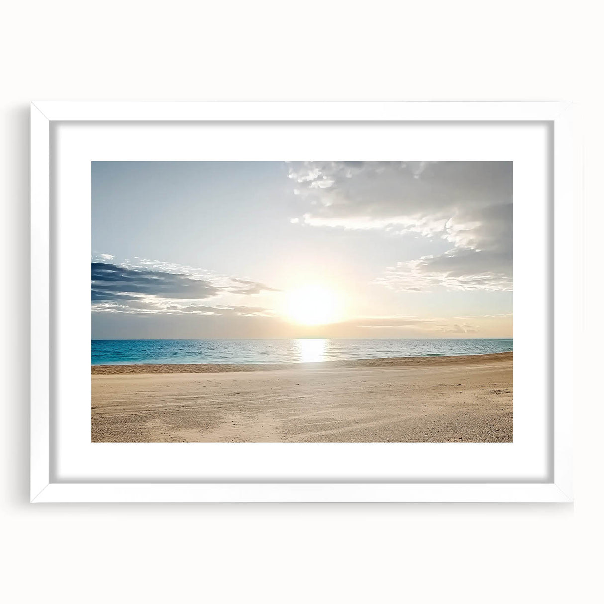 White-framed landscape artwork showcasing a serene beach scene with gentle waves and a clear blue sky. Perfect for coastal-themed home decor or beach lovers.