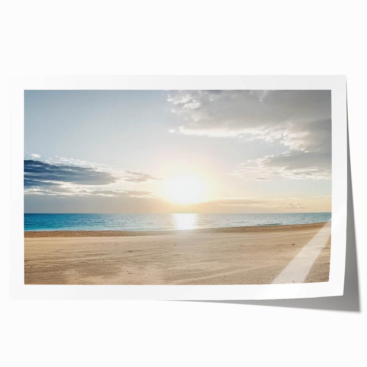 Vibrant rolled print depicting a serene beach landscape, showcasing soft sand and gentle waves under a bright blue sky, packaged securely in a protective tube.