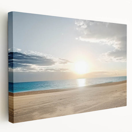 Stretched canvas artwork depicting a serene beach landscape, showcasing vibrant colors and natural scenery, perfect for home or office decor. The piece highlights tranquil waves and a clear sky, adding a calming ambiance to any space.