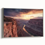 Framed canvas artwork depicting a stunning landscape of canyons, showcasing rich earthy tones and intricate details, elegantly bordered with a silver frame. Ideal for enhancing home decor with a natural theme.